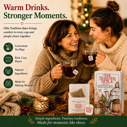 Two women smiling and holding mugs of tea in a cozy indoor setting, with Olde Tradition Spice tea bags and tea boxes displayed in the foreground. The image includes marketing text and product packaging for Olde Tradition Spice.